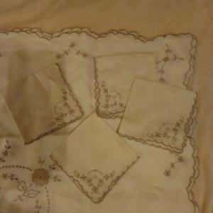Vintage Napkins and table cloth. Marks on two napkins.